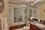 Lower Level Bath with exceptional custom tile work
